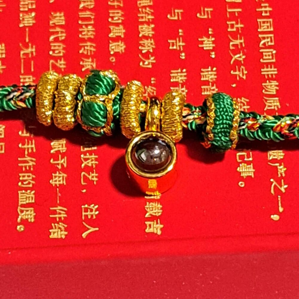 Green and gold bracelet with original box
